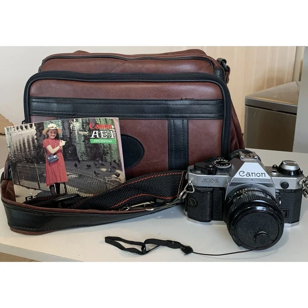 Canon AE-1 Program SLR 35mm Film Camera w/ 50mm F/1.8 Lens & Camera Bag & More
